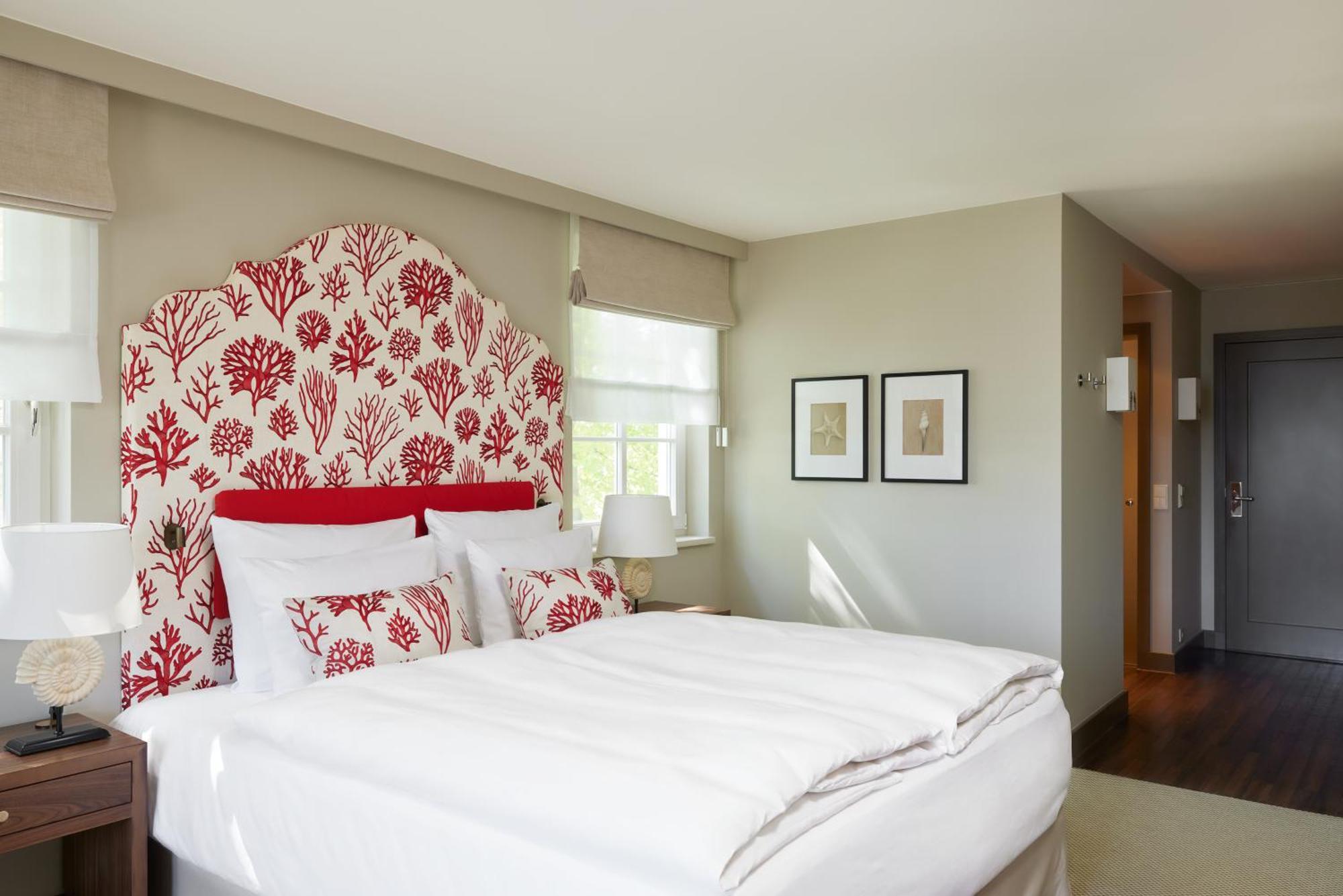 ชไตเกนแบร์เกอร์ ชตรันด์โฮเต็ล แอนด์ สปา ซิงสท์ Hotel ภายนอก รูปภาพ A bedroom at the Hotel du Cap-Eden-Roc